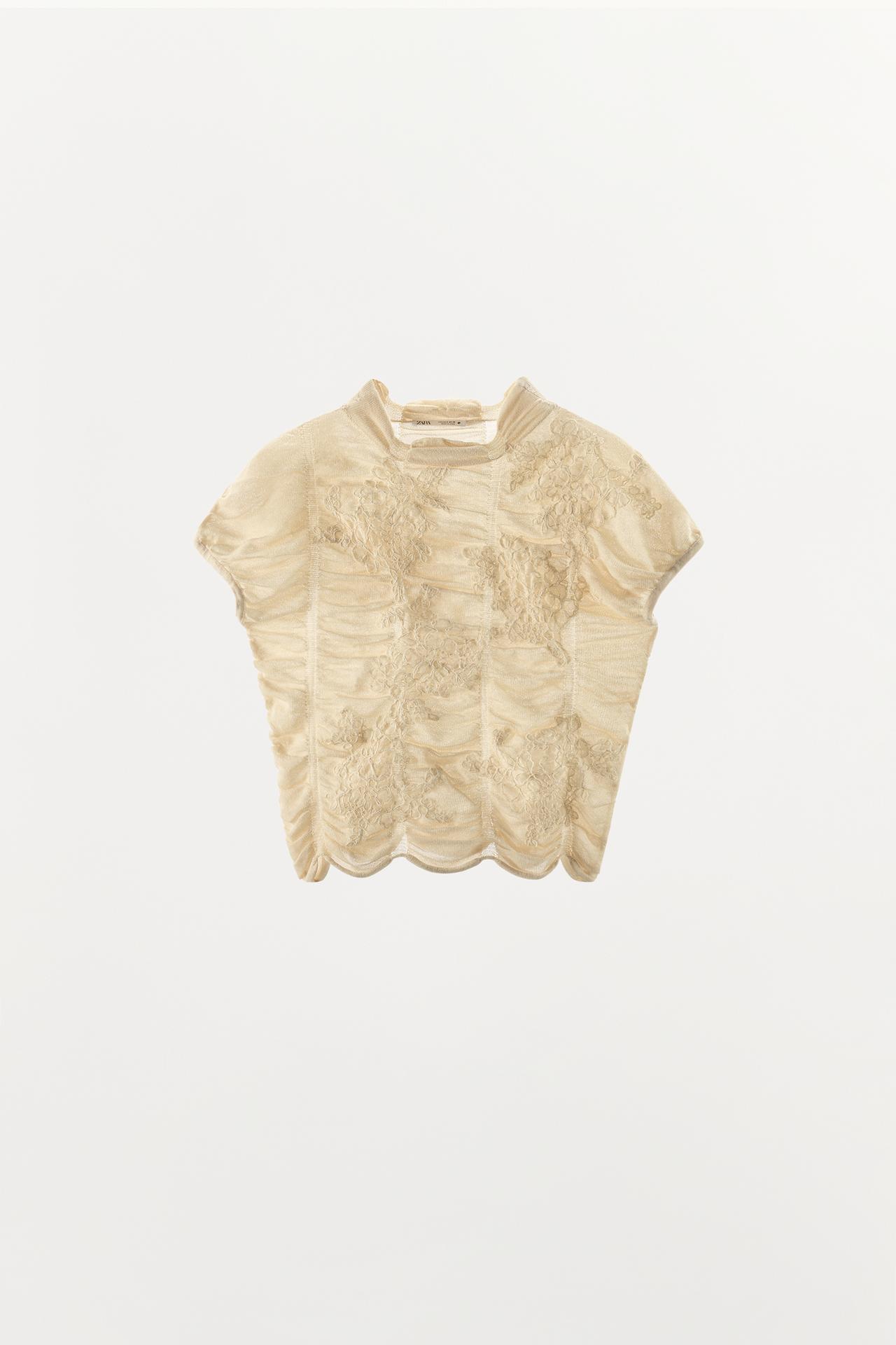 EMBROIDERED RUCHED KNIT TOP